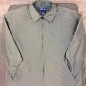 Spring jacket, zip front and self-storing pocket